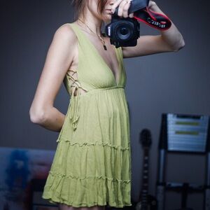 NWOT green mini dress, Hawaiian boutique Mahina, lace-up details, size small.